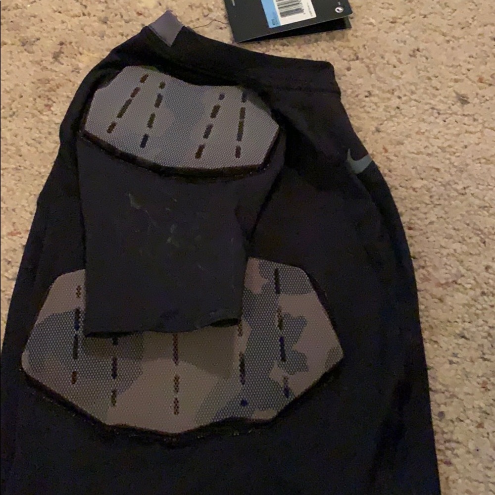 Boys Football Pad Undershirt. NWT. Size Medium